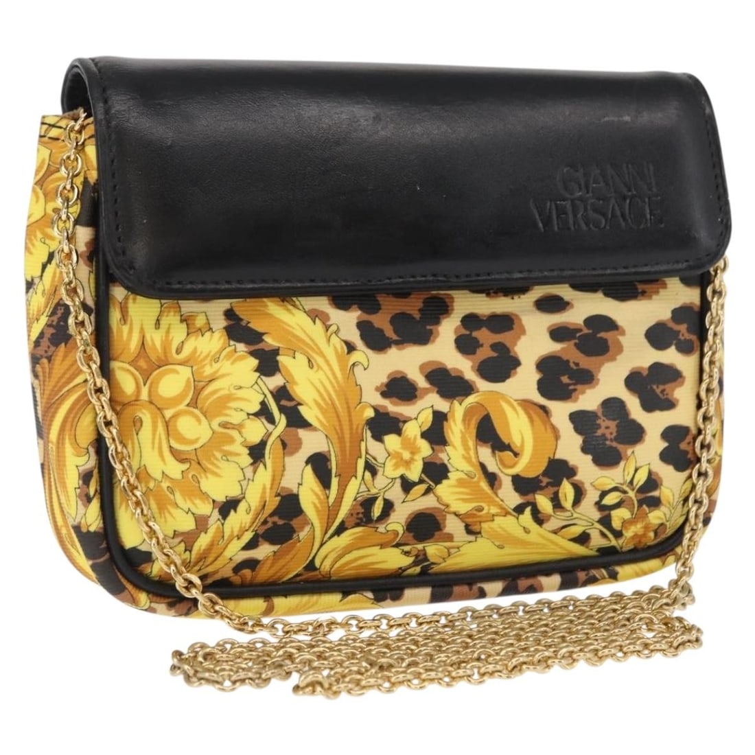 Gianni Versace Yellow Black PVC Canvas Chain Shoulder Bag: Gianni Versace Yellow Black PVC Canvas Chain Shoulder Bag This Gianni Versace shoulder bag features a striking yellow, black, and gold color scheme with PVC leather construction. The bag is compact an
