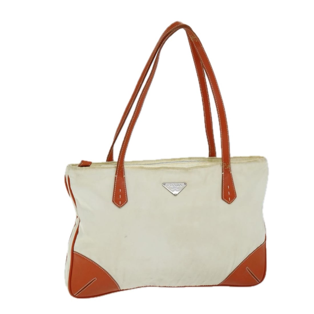 Prada nylon beige orange tote bag Italy women: Prada nylon beige orange tote bag Italy women This PRADA tote bag is crafted from durable nylon in a beige and orange color combination. Designed for women, it features a spacious interior and practic