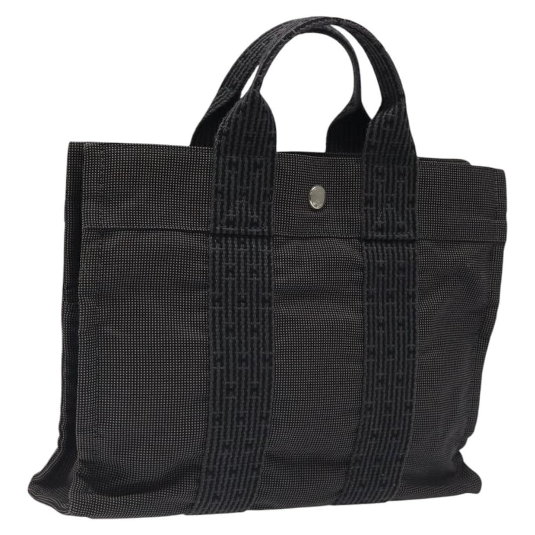 Hermes Her Line PM Gray Canvas Women's Tote Bag from France: Hermes Her Line PM Gray Canvas Women's Tote Bag from France This Hermes Her Line PM tote bag is crafted from gray and silver canvas. Designed for women, it features a compact silhouette with dual hand