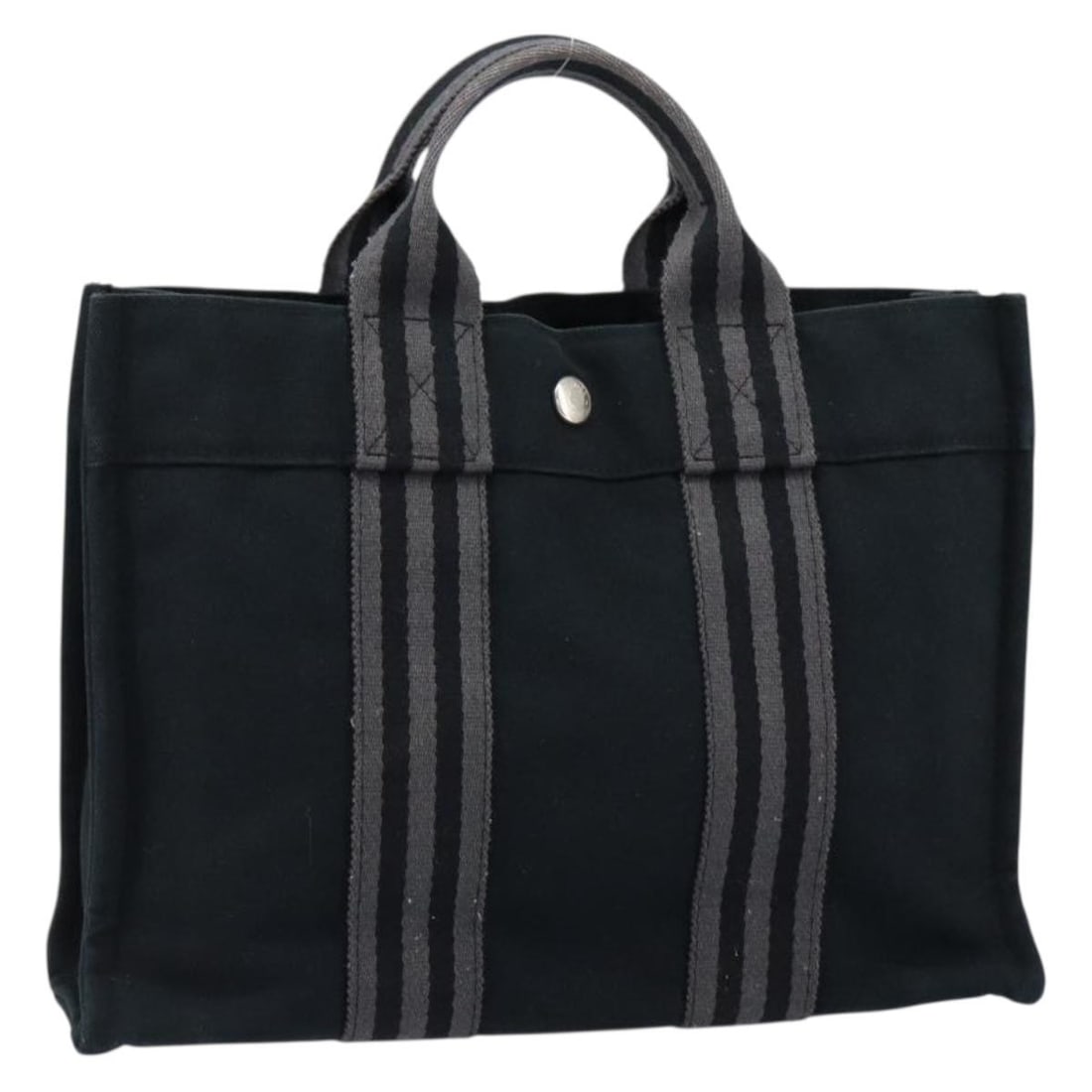 HERMES Fourre Tout PM Handbag Black Silver Canvas Auth APX: HERMES Fourre Tout PM Handbag Black Silver Canvas Auth APX Introducing the HERMES Fourre Tout PM Hand Bag, a stylish and functional accessory crafted from durable canvas. This bag features a sophistic
