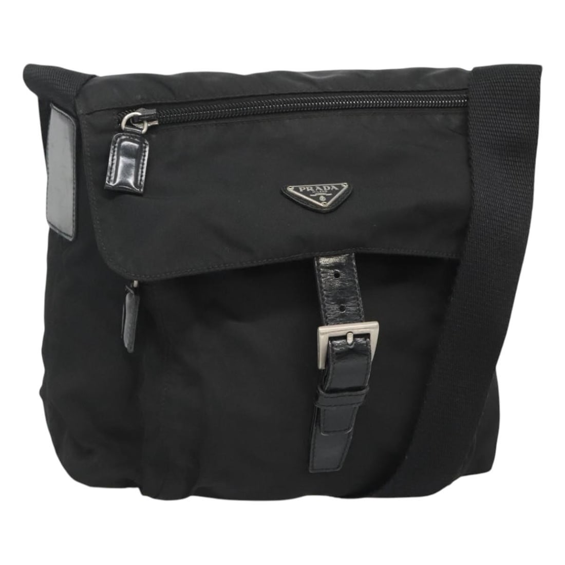 Prada black nylon shoulder bag Italy silver tone: Prada black nylon shoulder bag Italy silver tone This PRADA shoulder bag features a black nylon exterior with silver-tone accents. Designed for women, it is made in Italy and offers a practical size w