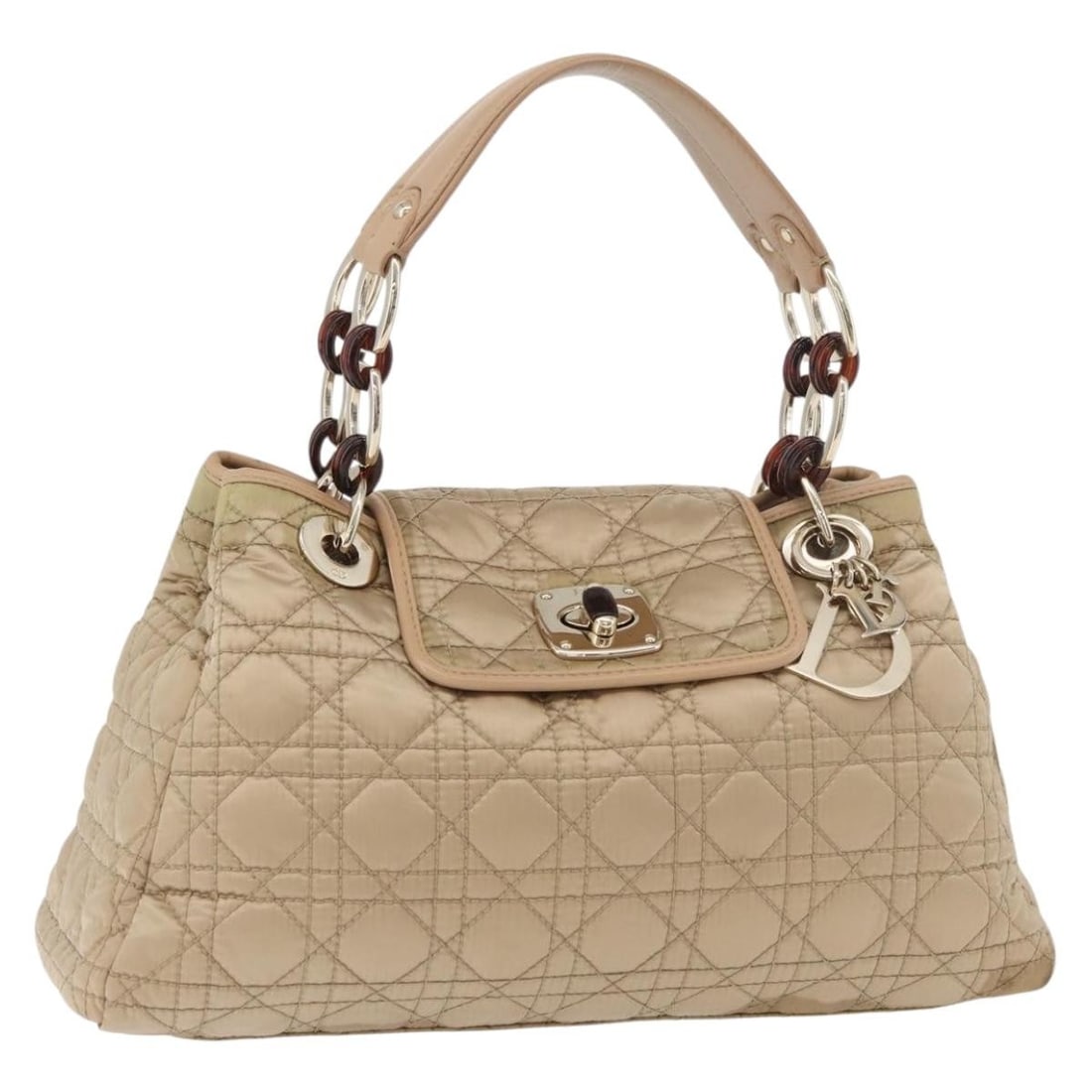 Lady Dior Nylon Gold Handbag with Charm by Christian Dior: Lady Dior Nylon Gold Handbag with Charm by Christian Dior This Christian Dior Lady Dior handbag features the iconic Cannage pattern in gold nylon, complemented by a matching charm accessory. Designed 
