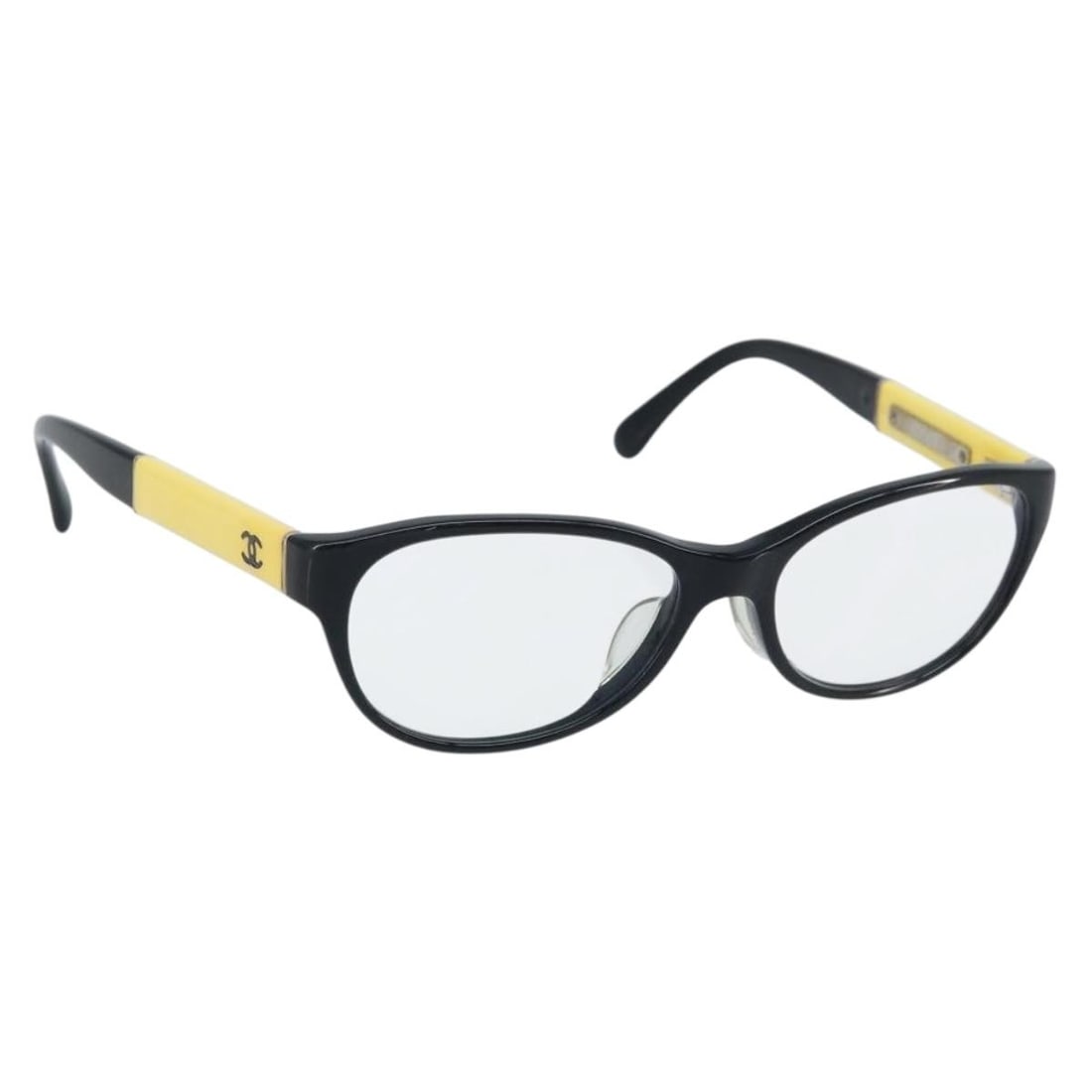 Black Plastic Glasses for Women by CHANEL Italy: Black Plastic Glasses for Women by CHANEL Italy These CHANEL women's glasses feature a black plastic frame with the iconic CC logo. Made in Italy, they are designed for everyday wear. The glasses are 