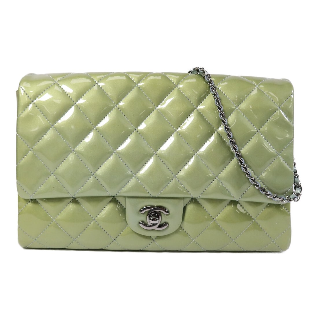 Green Patent Leather CHANEL Classic Flap Shoulder Bag: Green Patent Leather CHANEL Classic Flap Shoulder Bag This CHANEL Classic Flap Chain Shoulder Bag features a striking green patent leather exterior and signature CC hardware in silver-tone finish. Des