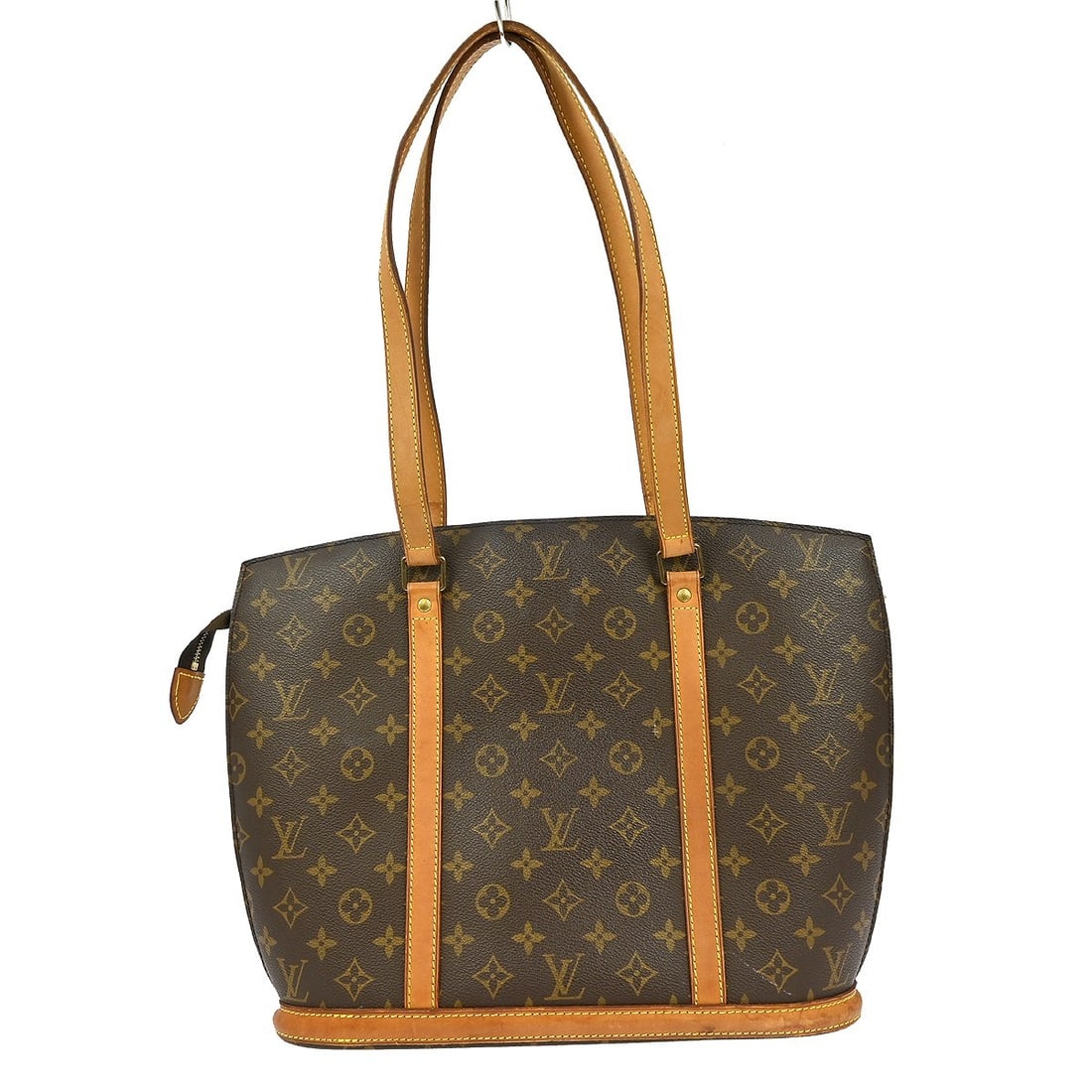 Louis Vuitton Babylone Monogram Canvas Tote Bag: Louis Vuitton Babylone Monogram Canvas Tote Bag This Louis Vuitton Babylone shoulder tote bag features the classic Monogram canvas leather exterior in brown, complemented by double handles and a zip c