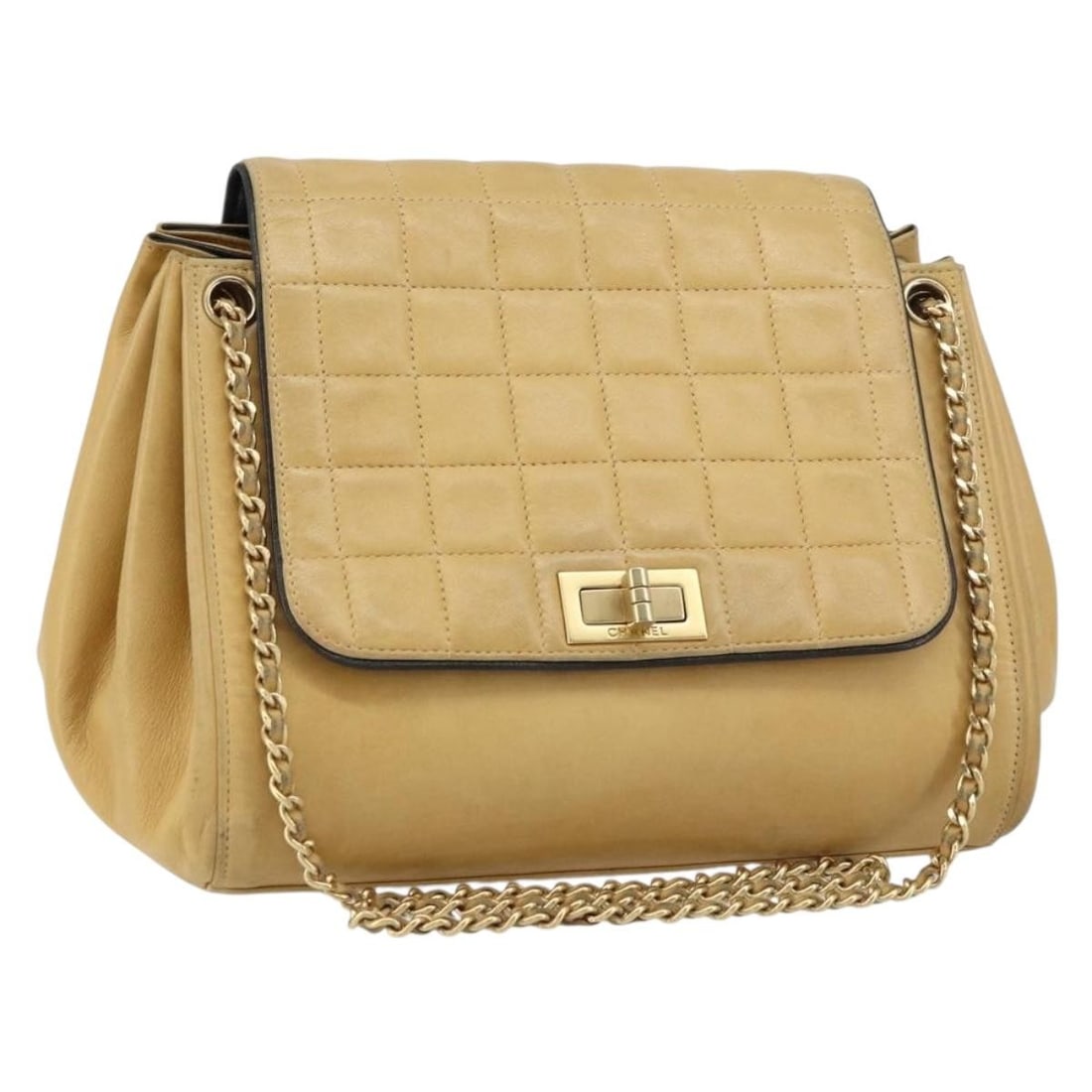 Chanel Choco Bar Beige Lambskin Chain Shoulder Purse with Dust Bag: Chanel Choco Bar Beige Lambskin Chain Shoulder Purse with Dust Bag This CHANEL Choco Bar line chain shoulder bag is crafted from beige lambskin leather with gold-tone accents. Designed in a compact si