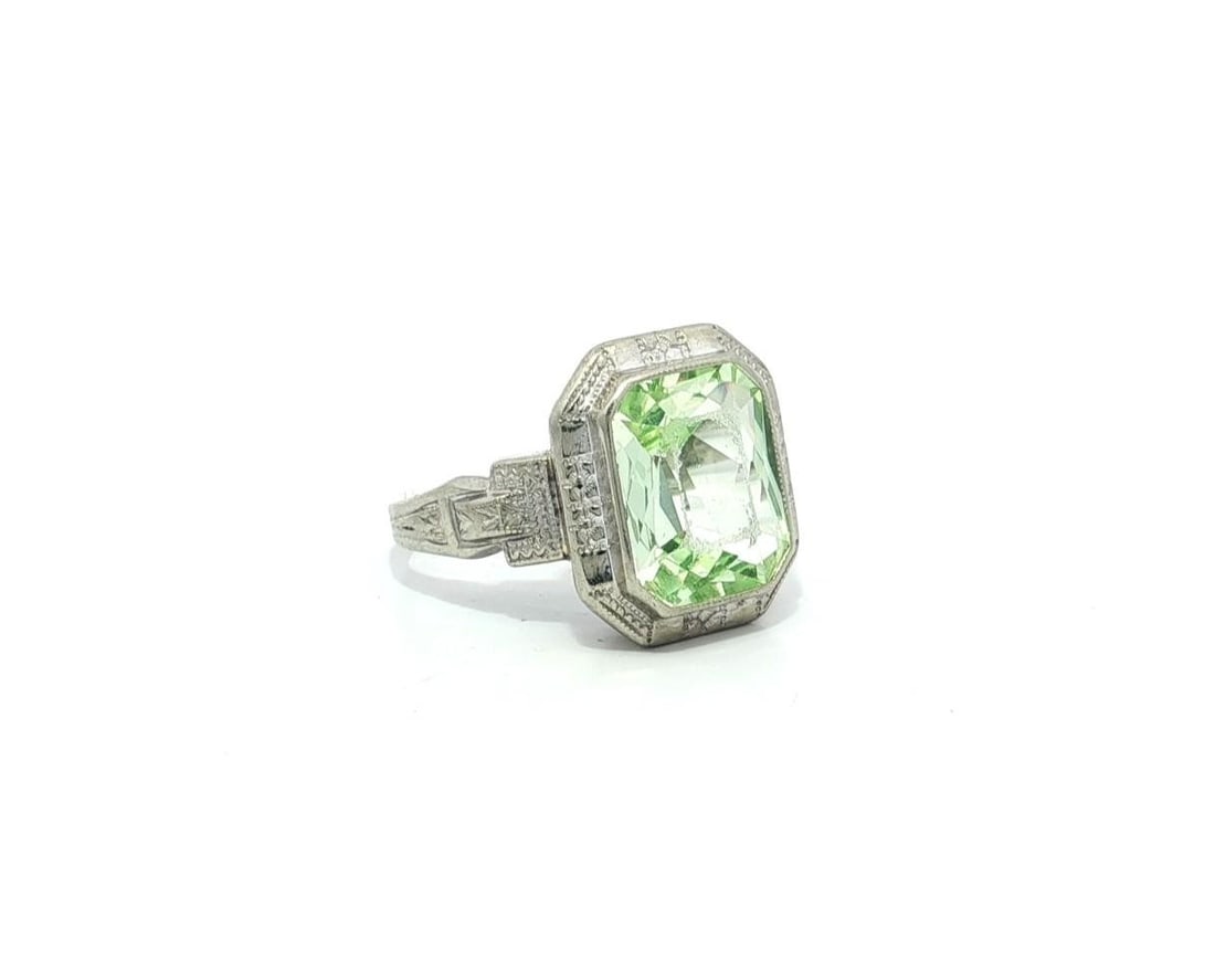Antique Art Deco 14k White Gold Green Amethyst Ring Hand Engraved: Antique Art Deco 14k White Gold Green Amethyst Ring Hand Engraved Discover the elegance of this Antique Art Deco ring, featuring a stunning natural green amethyst in an emerald cut. The stone is bezel