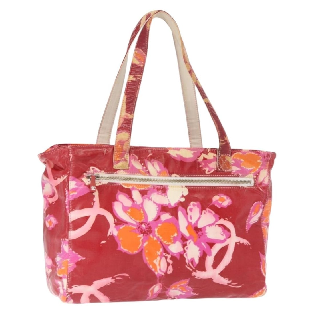 Red Coated Canvas Tote from Chanel High Summer Collection: Red Coated Canvas Tote from Chanel High Summer Collection This CHANEL High Summer tote bag is crafted from red coated canvas and features the classic CC logo. The bag offers a spacious design with top
