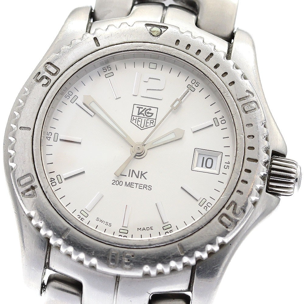TAG Heuer Link Quartz Date Men's Stainless Steel Watch WT1212-0: TAG Heuer Link Quartz Date Men's Stainless Steel Watch WT1212-0 This TAG HEUER Link Date Quartz men's wristwatch, model WT1212-0, features a stainless steel case and bracelet with a silver dial. The w