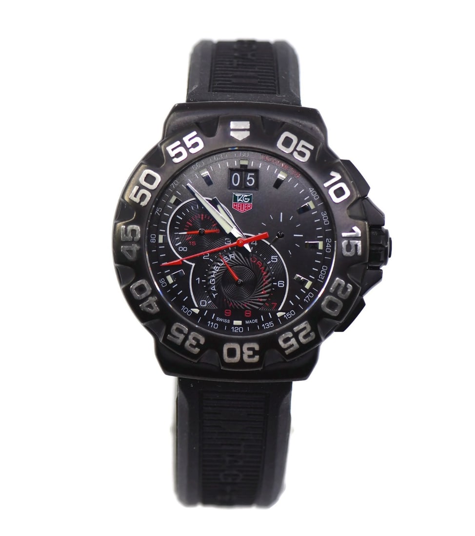 TAG Heuer Formula 1 CAH1012 Stainless Steel Sport Watch with Box: TAG Heuer Formula 1 CAH1012 Stainless Steel Sport Watch with Box Presenting the TAG Heuer Formula 1 Stainless Steel Watch CAH1012, a classic sports timepiece. This wristwatch features a durable stainl