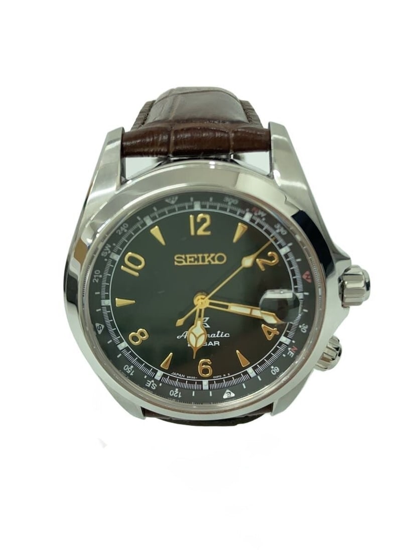 Seiko Prospex Alpinist Green Leather Wristwatch: Seiko Prospex Alpinist Green Leather Wristwatch This Seiko Prospex Alpinist SBDC091/6R35-00E0 men's wristwatch features a green dial and a leather band. Made in Japan, the watch is in slightly used co