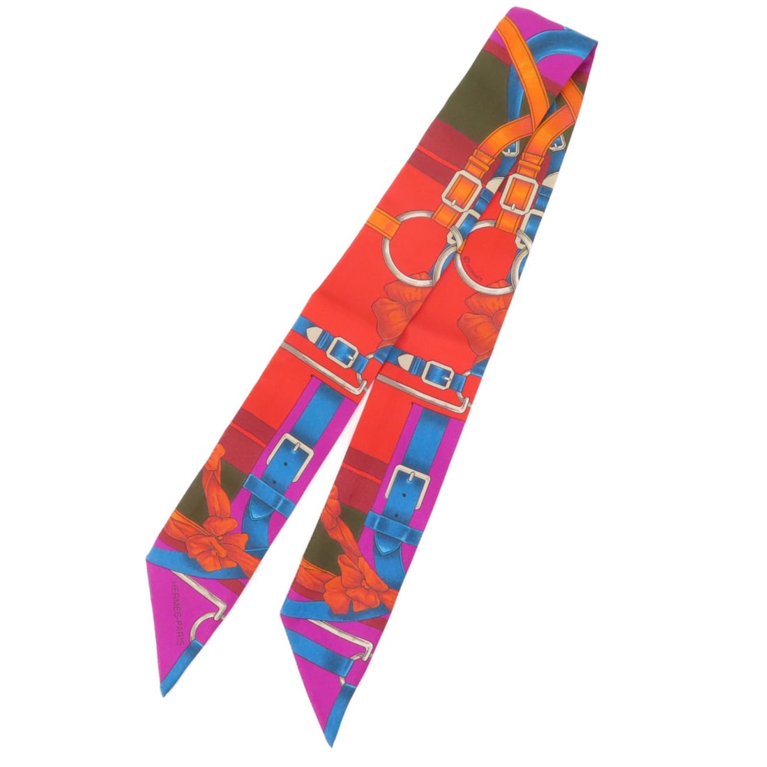 Multicolor Silk Twilly Scarf by HERMES Women's Accessory France: Multicolor Silk Twilly Scarf by HERMES Women's Accessory France This Hermes Twilly scarf for women is crafted from luxurious silk and features a vibrant multicolor design. Made in France, it offers a 