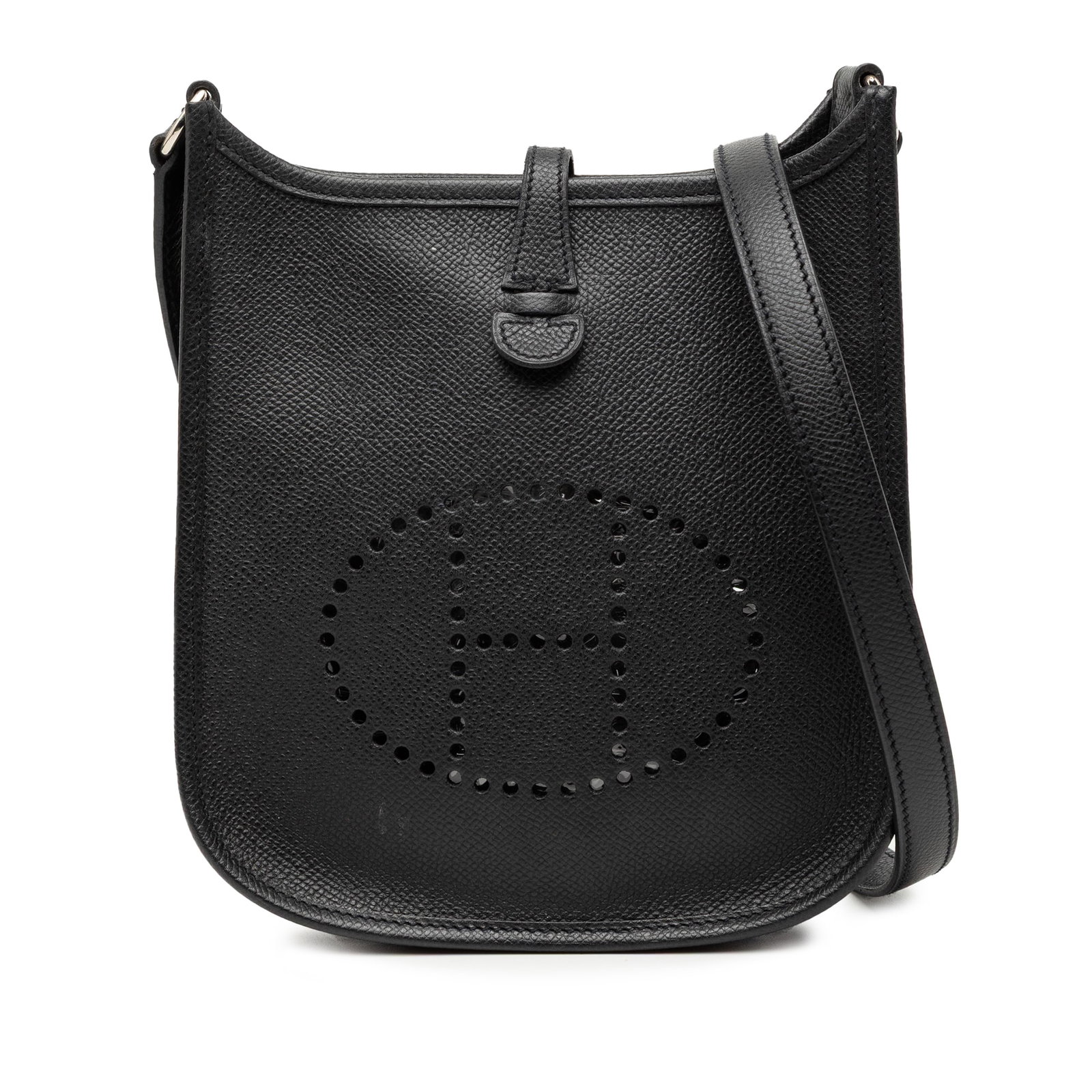 Black Epsom Leather Hermes Evelyne 16 Bag With Canvas Strap: Black Epsom Leather Hermes Evelyne 16 Bag With Canvas Strap The Hermes Epsom Evelyne 16 features a Noir Epsom leather body, a detachable flat canvas strap, and an open top with a tuck closure. This ba