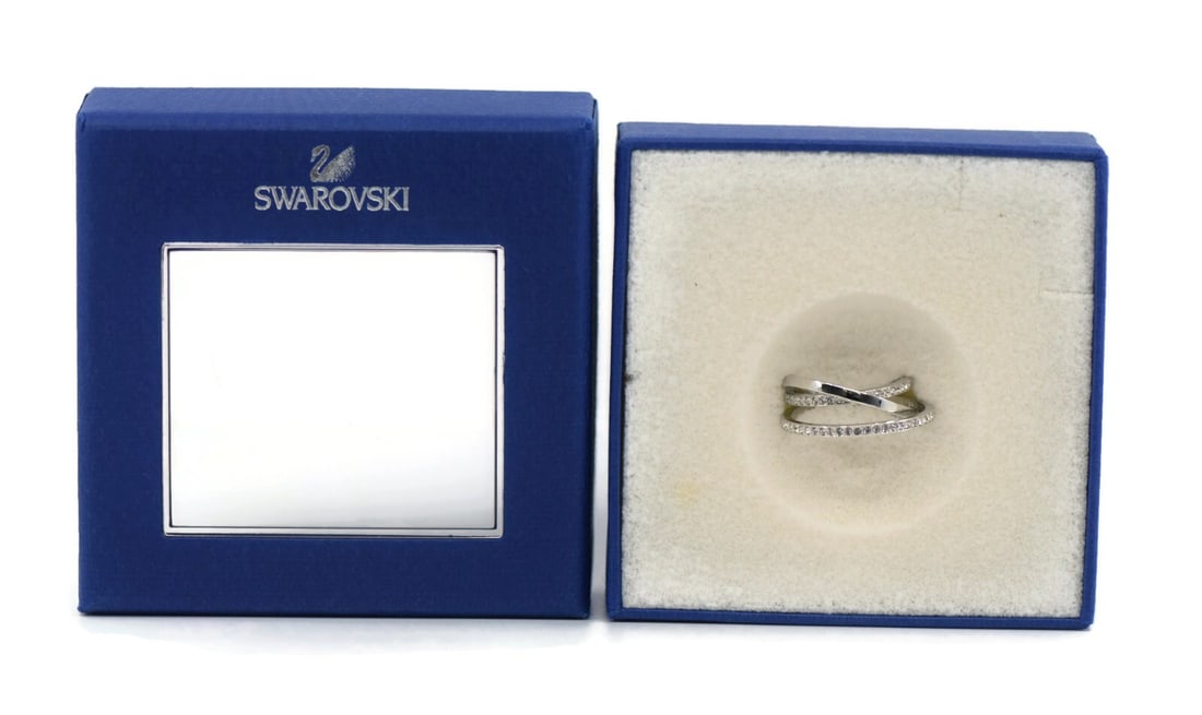 Swarovski Spiral Crystal Ring 5.5 Authentic with Box 5106545: Swarovski Spiral Crystal Ring 5.5 Authentic with Box 5106545 This stunning Swarovski Spiral Crystal Ring, sized 5.5, showcases the exquisite craftsmanship synonymous with the Swarovski brand. Crafted 