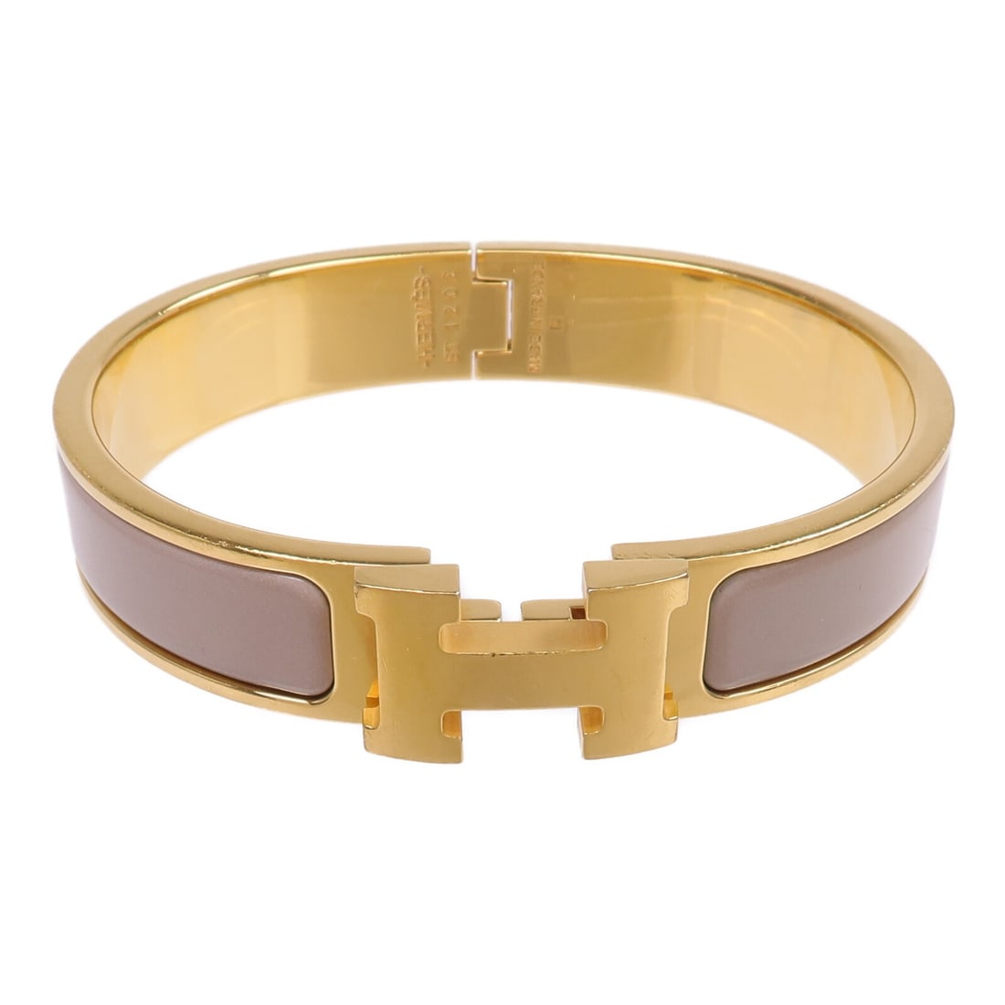 Beige Enamel Clic H Gold Tone Bracelet by Hermes for Women: Beige Enamel Clic H Gold Tone Bracelet by Hermes for Women This Hermes Clic H bracelet features a beige enamel exterior set in metal, offering a refined and timeless accessory for women. Designed with