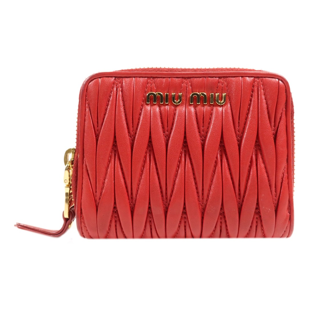 Red Lambskin Bi-Fold Wallet by Miu Miu with Gold Hardware: Red Lambskin Bi-Fold Wallet by Miu Miu with Gold Hardware This Miu Miu bi-fold wallet is crafted from luxurious red lambskin leather, designed for women. It features gold-tone hardware for an elegant 