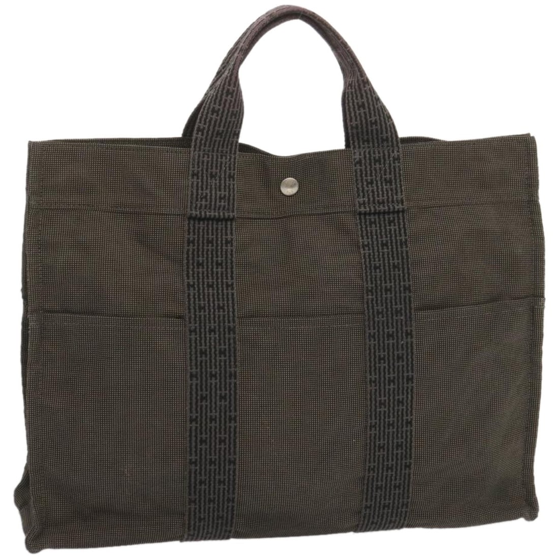 Fourre-tout Herline gray canvas tote bag by Hermes: Fourre-tout Herline gray canvas tote bag by Hermes The Hermes Fourre-tout Herline is a women's tote crafted from gray canvas. Made in France, this bag features a spacious design suitable for everyday 