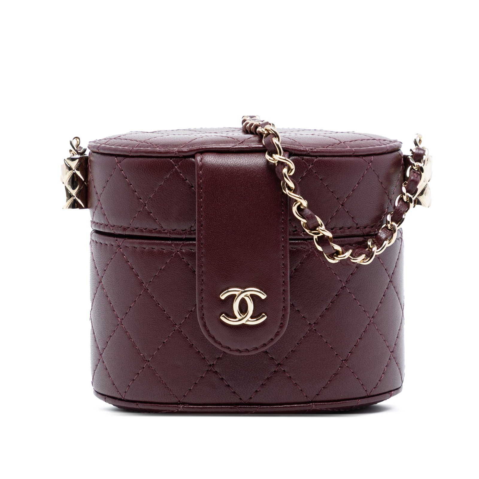 Chanel Red Quilted Lambskin Round Vanity Bag with Chain Strap: Chanel Red Quilted Lambskin Round Vanity Bag with Chain Strap This Chanel CC Quilted Lambskin Round Vanity Case features a luxurious quilted lambskin leather exterior in red, complemented by a leather