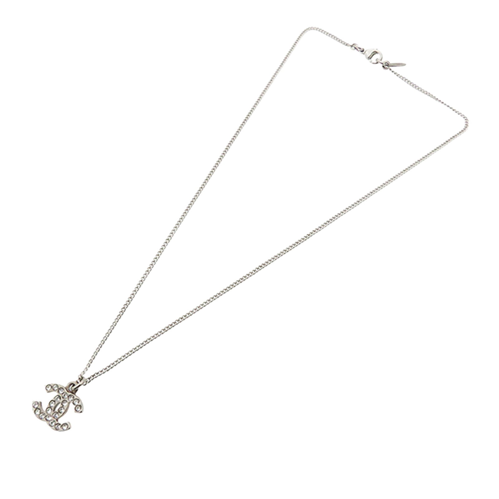 Chanel CC Motif Necklace with Rhinestone Accents and Silver Tone Finish: Chanel CC Motif Necklace with Rhinestone Accents and Silver Tone Finish This Chanel necklace features a silver-tone chain with a signature CC pendant adorned with rhinestone embellishments. It has a l