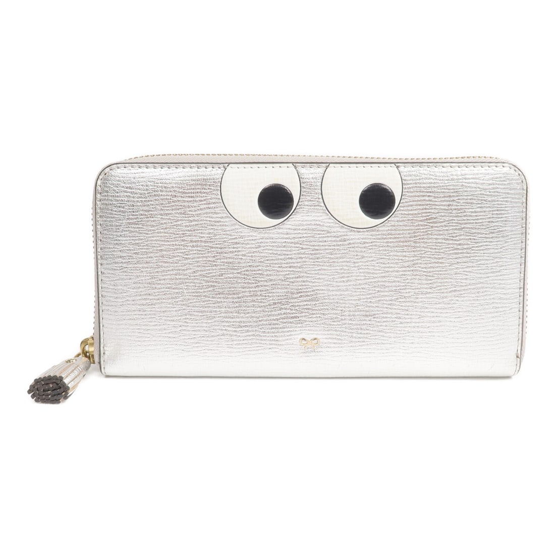 Anya Hindmarch Silver Calfskin Around Long Wallet with Gold Hardware: Anya Hindmarch Silver Calfskin Around Long Wallet with Gold Hardware This Anya Hindmarch long wallet is crafted from high-quality calfskin leather in a silver color. Designed for women, it features a 