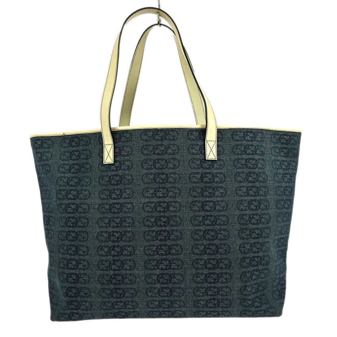 Gucci GG Blue Canvas Medium Tote Top Handle Bag 257245.498879 Vintage: Gucci GG Blue Canvas Medium Tote Top Handle Bag 257245.498879 Vintage This Gucci GG tote handbag features a blue canvas exterior with leather accents and the signature Gucci GG pattern. Designed in a 