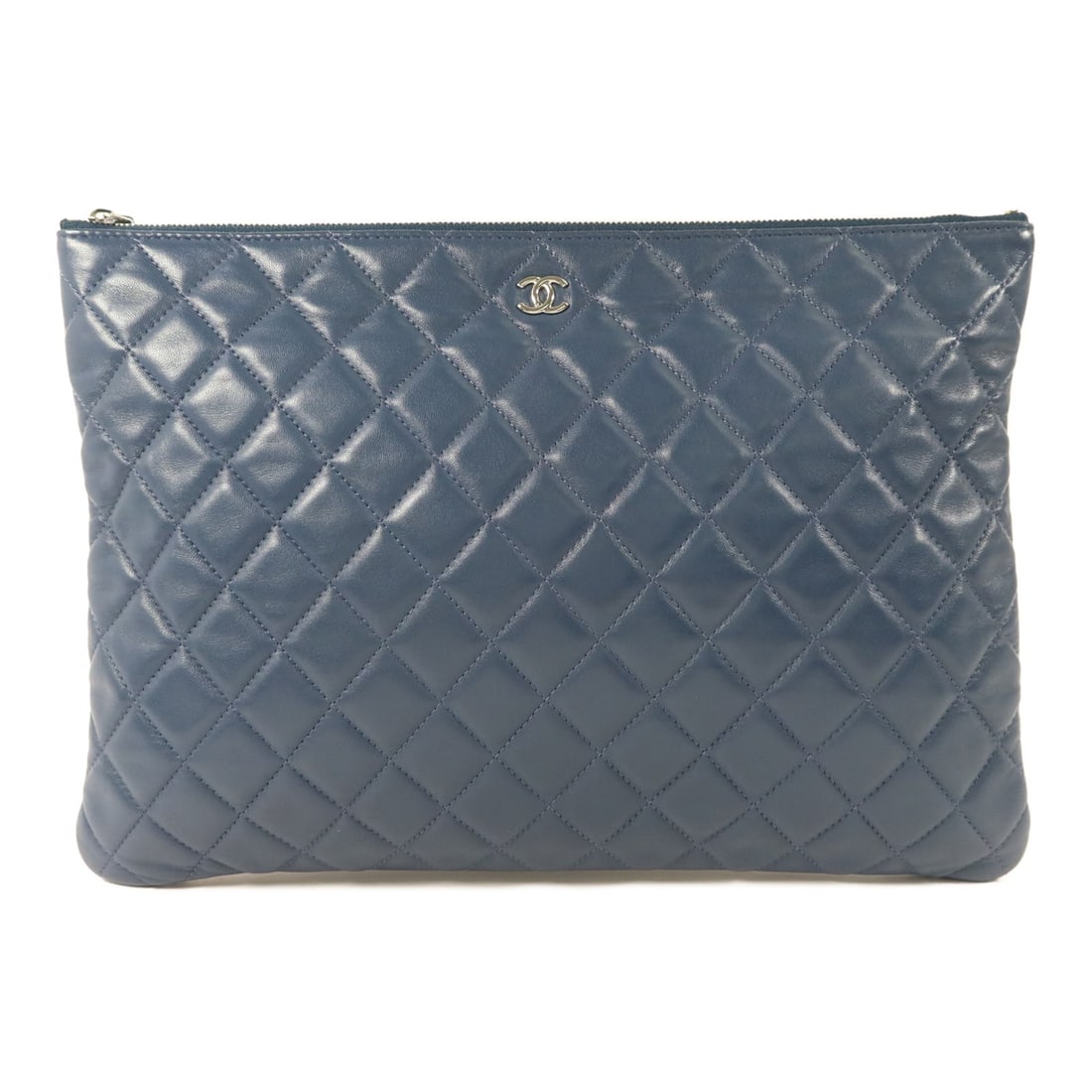 CHANEL Blue Lambskin CC Pouch: CHANEL Blue Lambskin CC Pouch This CHANEL pouch is crafted from blue lambskin leather, offering a soft and luxurious feel. Designed for women, it features a sleek profile with silver-tone hardware and