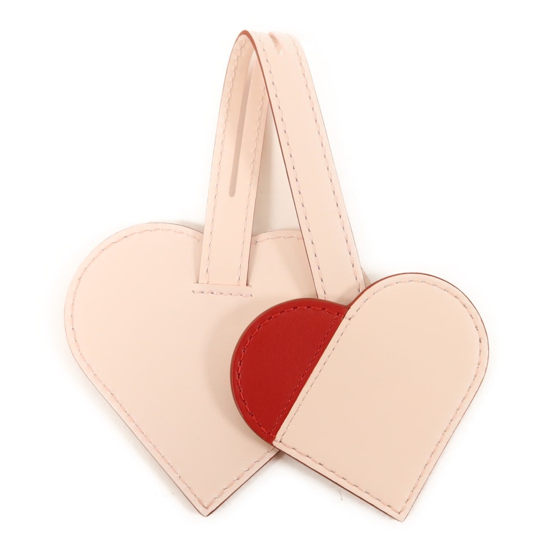 Delvaux Box Calfskin Heart D Coeur Pink Red Bag Charm: Delvaux Box Calfskin Heart D Coeur Pink Red Bag Charm This Delvaux D Coeur charm is crafted from premium calfskin leather in a combination of pink and red tones. Designed for women, it features a chic