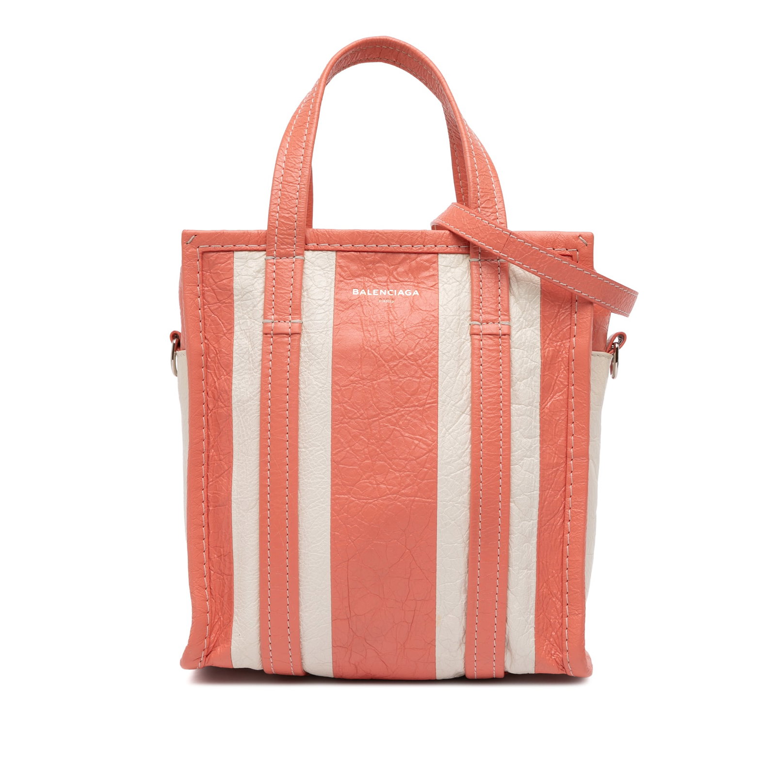 Balenciaga Pink XS Lambskin Bazar Shopper Satchel Italy: Balenciaga Pink XS Lambskin Bazar Shopper Satchel Italy The Balenciaga XS Lambskin Bazar Shopper Satchel is a stylish and sophisticated accessory crafted from luxurious lambskin leather. This satchel 