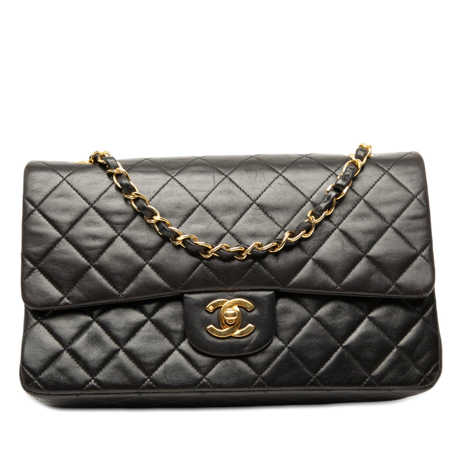 Black Lambskin Double Flap Shoulder Bag by Chanel Medium Classic: Black Lambskin Double Flap Shoulder Bag by Chanel Medium Classic This Chanel Medium Classic Double Flap shoulder bag is crafted from quilted black lambskin leather. It features leather-woven chain str