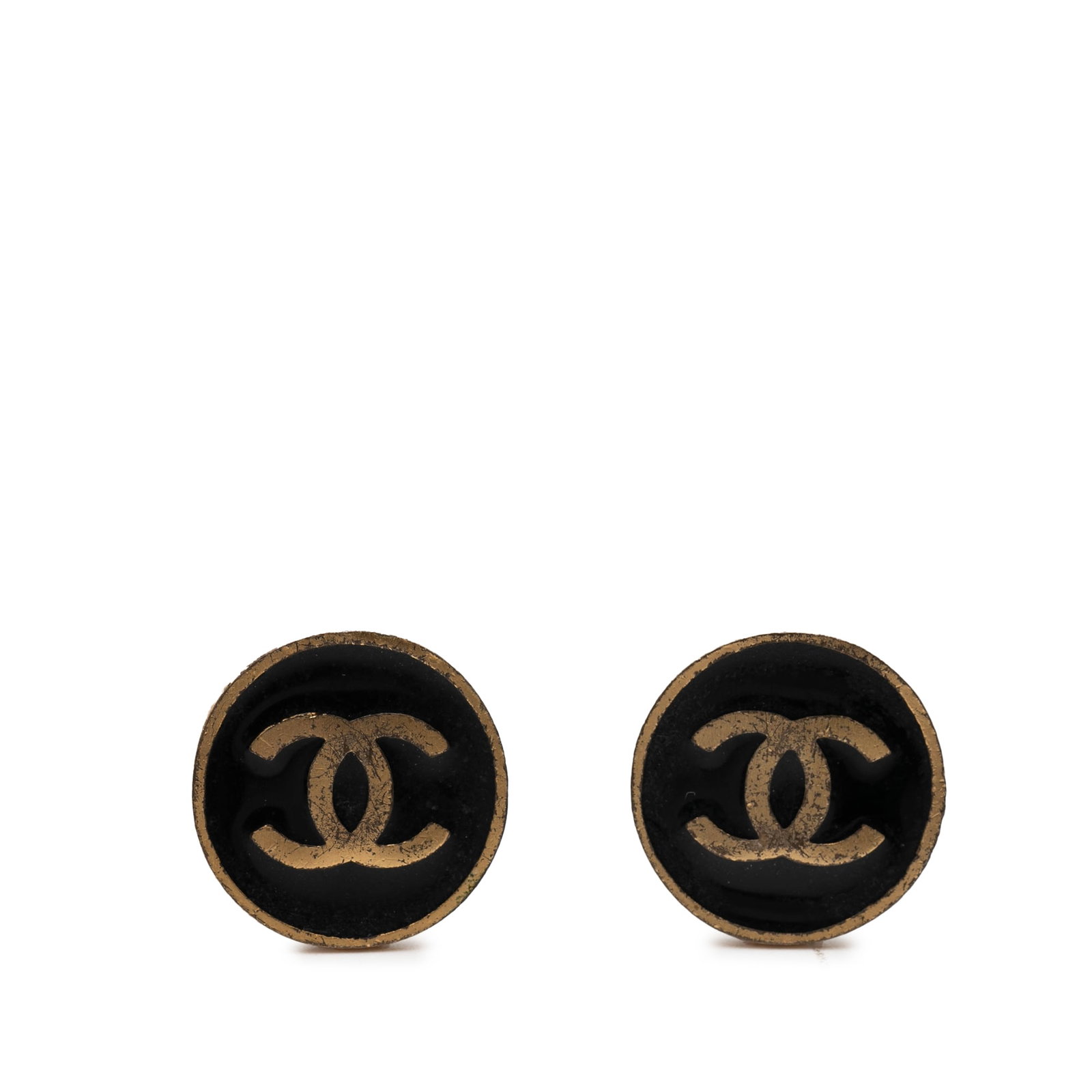 Chanel Enamel and Gold Tone CC Round Clip On Earrings: Chanel Enamel and Gold Tone CC Round Clip On Earrings These Chanel earrings feature a round button design crafted from gold-tone metal and enamel with clip-on closures. Made in France, they are catego