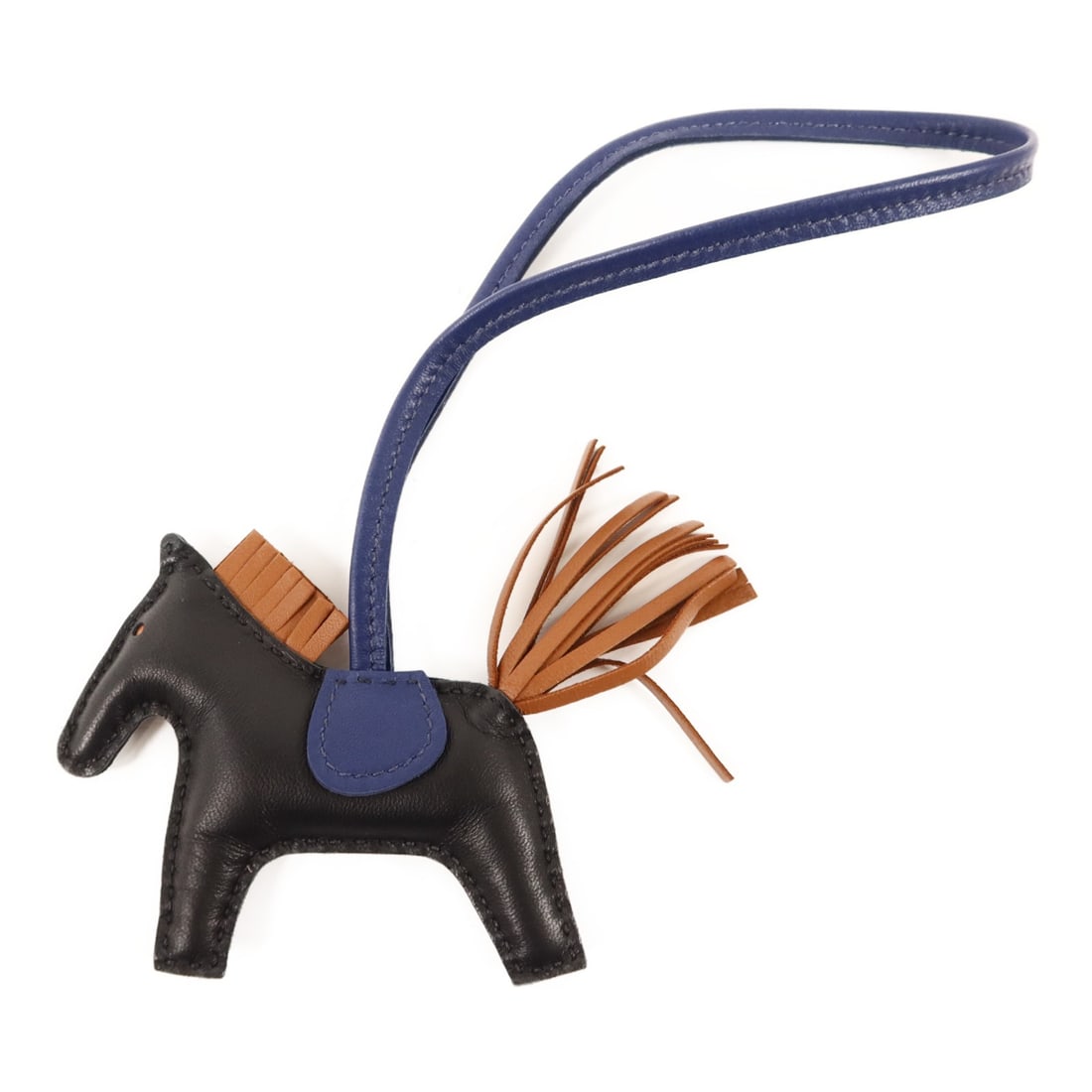 Hermes Rodeo PM Lambskin Bag Charm in Black Brown and Navy: Hermes Rodeo PM Lambskin Bag Charm in Black Brown and Navy This Hermes Rodeo PM charm is crafted from high-quality lambskin leather in a combination of black, brown, and navy blue tones. Designed for 