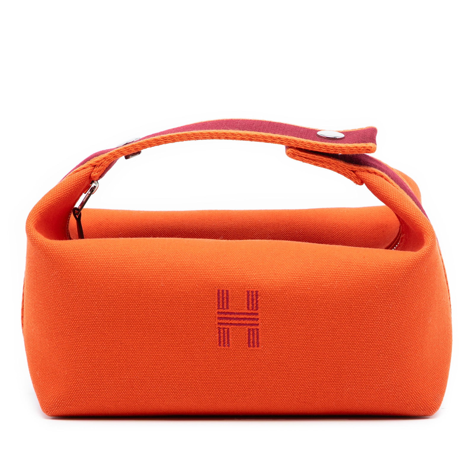 Orange Fabric Bride-A-Brac Pouch Small by Hermes with Top Zip: Orange Fabric Bride-A-Brac Pouch Small by Hermes with Top Zip This Hermes Small Toile Bride A Brac Case features an orange canvas body with a flat handle, top zip closure, and interior slip pockets. T