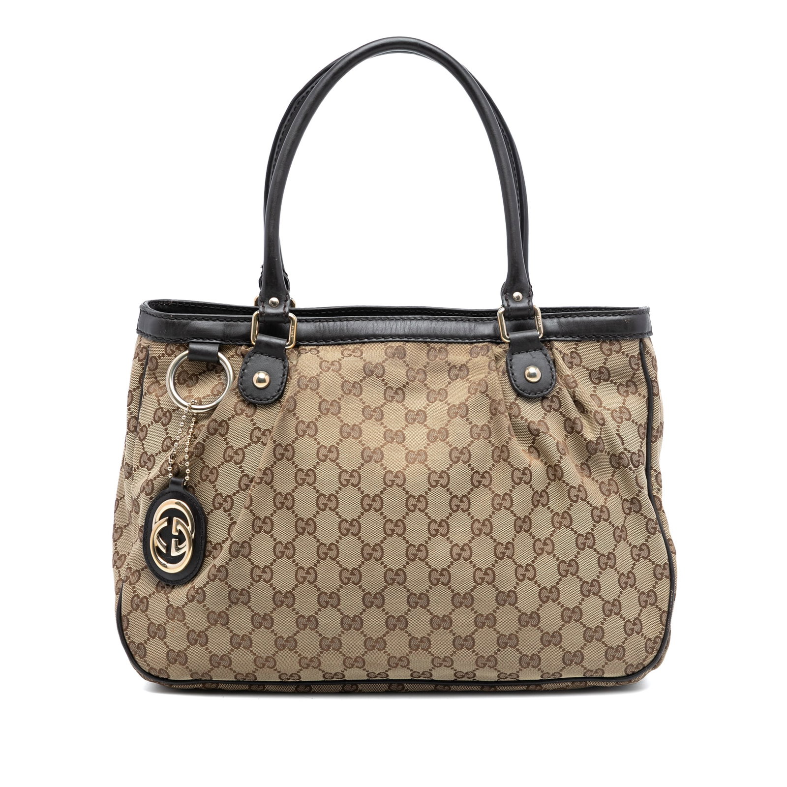 Beige GG Canvas Sukey Handbag with Leather Trim by Gucci: Beige GG Canvas Sukey Handbag with Leather Trim by Gucci This Gucci GG Canvas Sukey Tote features a beige canvas body with leather trim, rolled leather handles, a top zip closure, and an interior zip 
