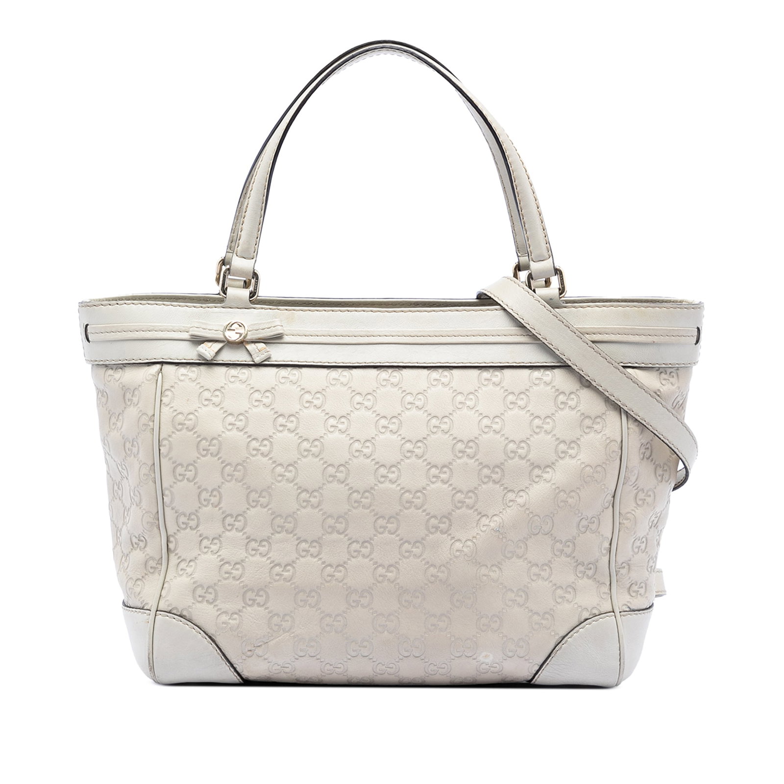 Gucci Mayfair Guccissima White Leather Tote Bag: Gucci Mayfair Guccissima White Leather Tote Bag The Mayfair tote features a white leather exterior with flat leather straps and an open top secured by a magnetic snap button. The interior is equipped 