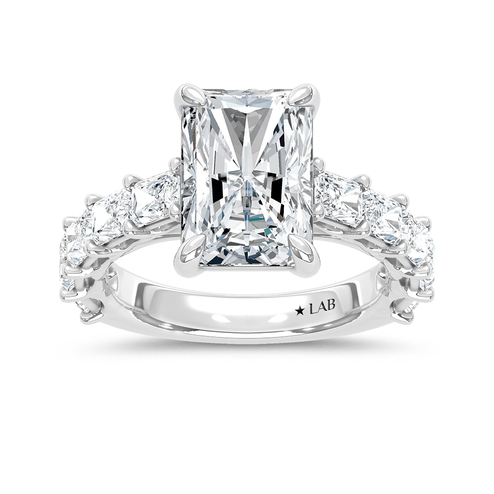 14K White Gold Lab Grown Diamond Elongated Radiant 6 Ct.Tw. Engagement Ring (IGI Certified Center: 14K White Gold Lab Grown Diamond Elongated Radiant 6 Ct.Tw. Engagement Ring (IGI Certified Center 4ct) This elegant diamond engagement ring crafted in 14k White gold, features a Elongated Radiant-cut 