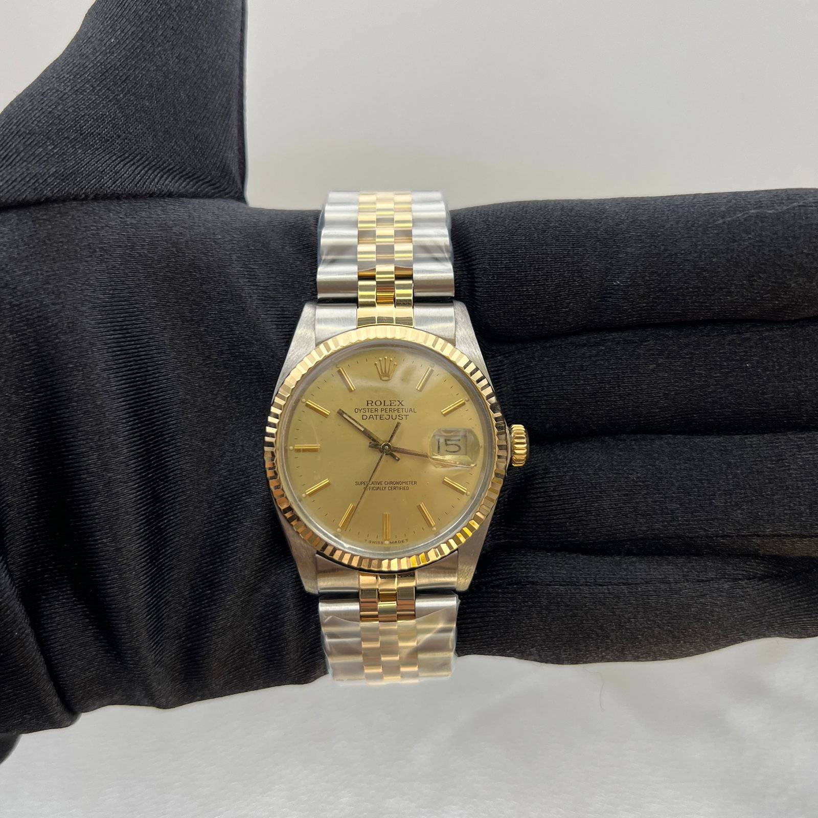 Champagne Stick Dial Aftermarket Jubilee Bracelet Datejust Ref 16013 Watch: Champagne Stick Dial Aftermarket Jubilee Bracelet Datejust Ref 16013 Watch This Rolex Datejust features a champagne stick dial, a fluted bezel, and is fitted with an aftermarket Jubilee bracelet. The 