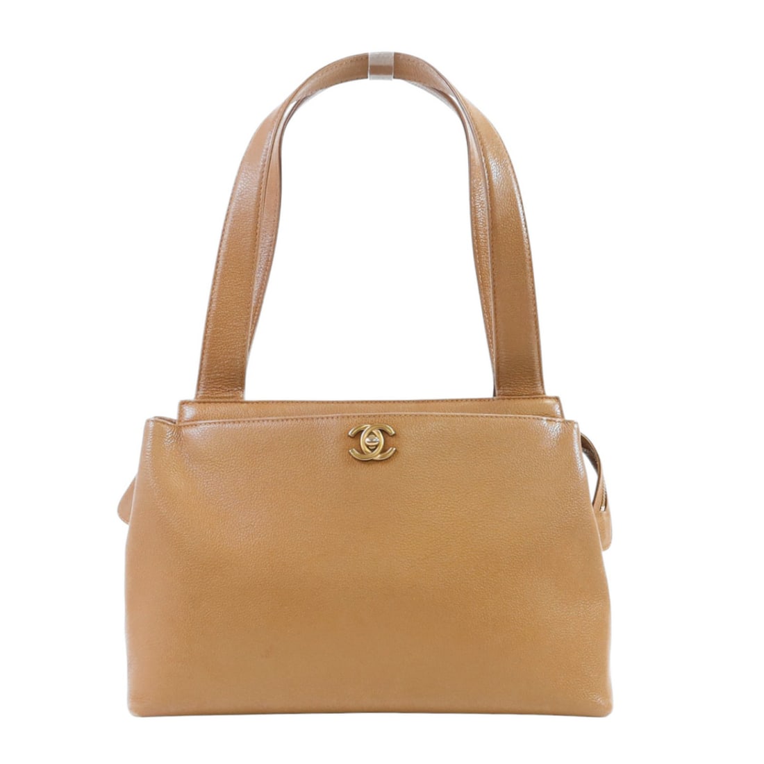 Beige Calfskin Leather Chanel Vintage Handbag with CC Logo and Gold Hardware: Beige Calfskin Leather Chanel Vintage Handbag with CC Logo and Gold Hardware This vintage Chanel handbag features beige calfskin leather and gold tone hardware. Crafted in France, it offers a classic 