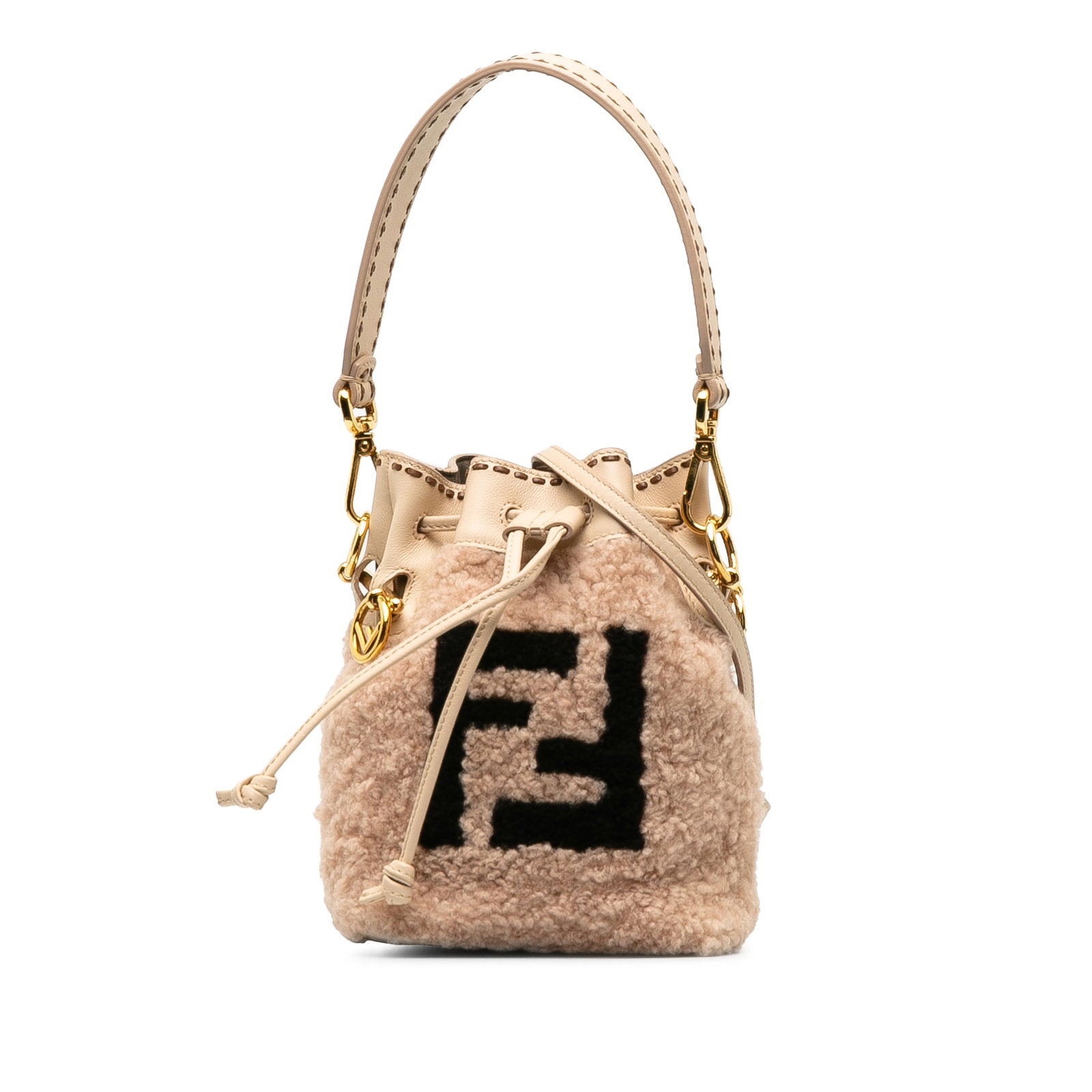 Fendi Shearling Mini Mon Tresor Bucket Bag Pink Natural Material: Fendi Shearling Mini Mon Tresor Bucket Bag Pink Natural Material The Fendi Shearling Mini Mon Tresor Bucket Bag showcases a luxurious fur body in a delightful pink hue. It features a flat leather top 