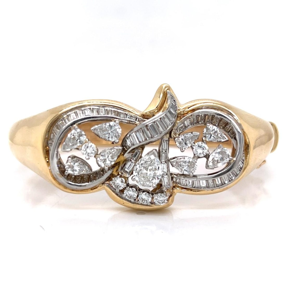 1960's 14K Yellow Gold Platinum Diamond Bangle Bracelet 7.20 Ct: 1960's 14K Yellow Gold Platinum Diamond Bangle Bracelet 7.20 Ct This exquisite 1960's bangle bracelet is crafted from 14K yellow gold and platinum, showcasing a stunning total diamond weight of 7.20 c