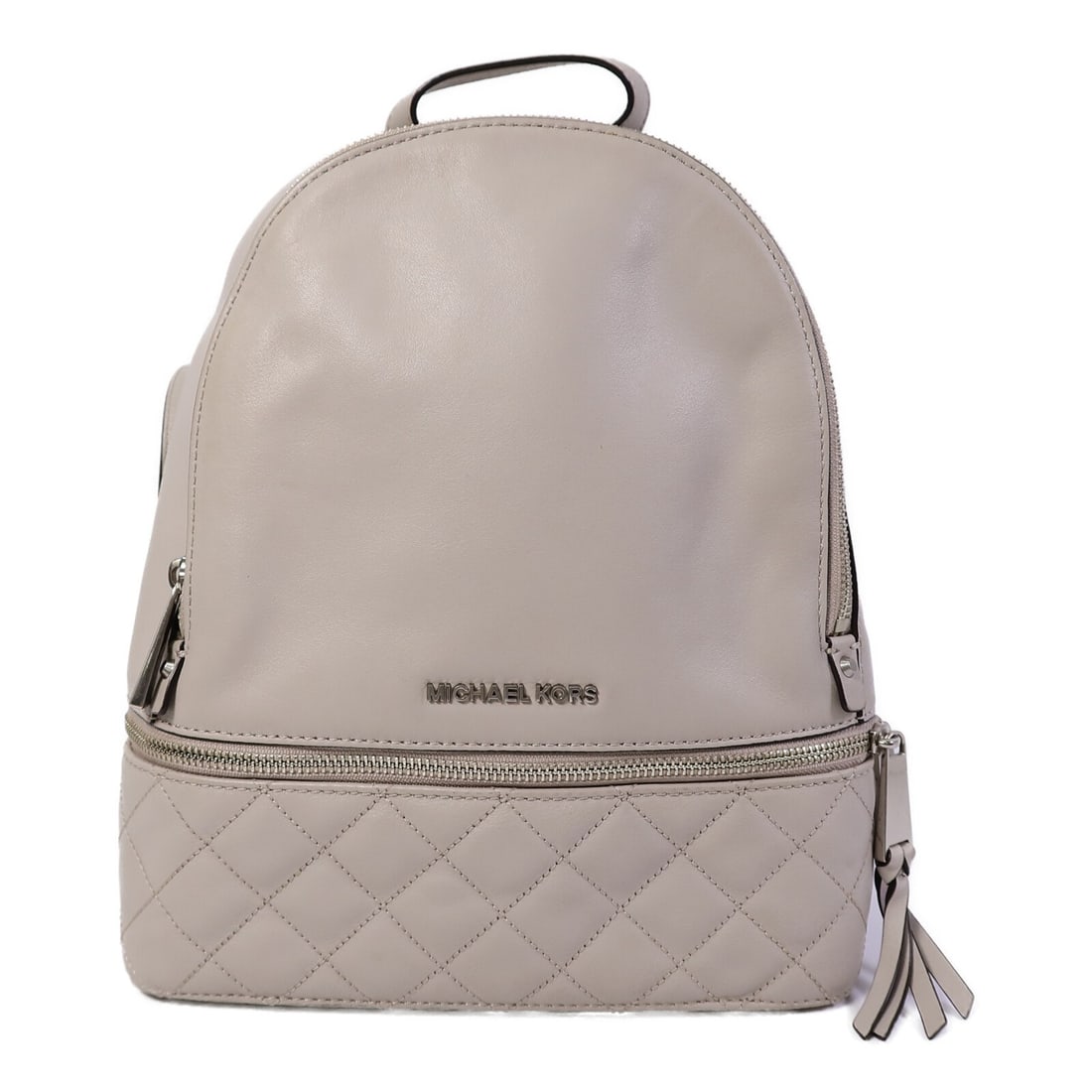 Michael Kors Gray Calfskin Rucksack Backpack: Michael Kors Gray Calfskin Rucksack Backpack This Michael Kors rucksack backpack is crafted from grey calfskin leather, offering a stylish and functional accessory for everyday use. Designed for women
