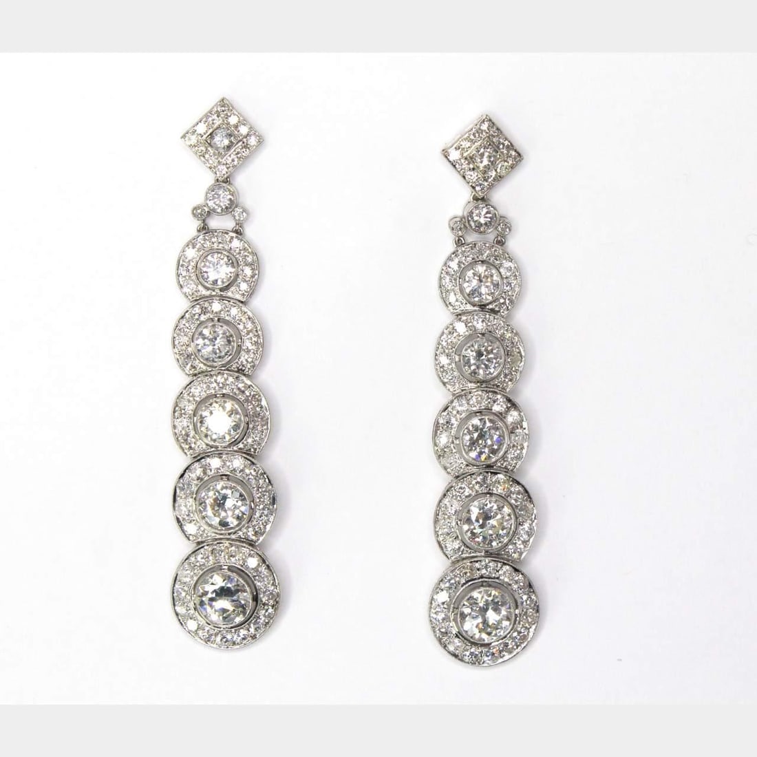 15.90 Ct Diamond Earrings in Platinum Mounting: 15.90 Ct Diamond Earrings in Platinum Mounting These stunning diamond earrings feature a total weight of 15.90 Ct, showcasing an exquisite array of diamonds. The earrings include two diamonds each of 