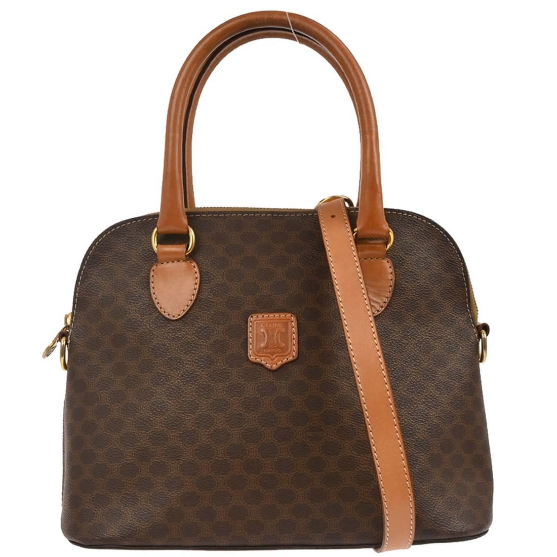 Brown Macadam 2way Top Handle Bag by Celine with Double Handles: Brown Macadam 2way Top Handle Bag by Celine with Double Handles This Celine Macadam 2-way handbag features a brown PVC leather exterior with the iconic Macadam pattern and logo accents. Designed with 