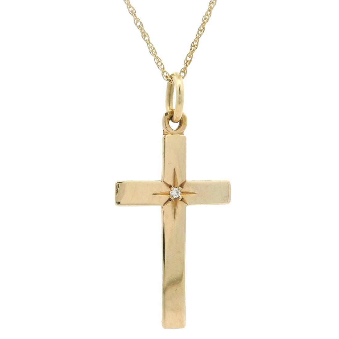 Vintage 14k Gold Diamond Cross Pendant with 17 Inch Rope Chain: Vintage 14k Gold Diamond Cross Pendant with 17 Inch Rope Chain This exquisite vintage pendant features a stunning star pave diamond cross design, crafted from solid 14k yellow gold. The pendant is ado