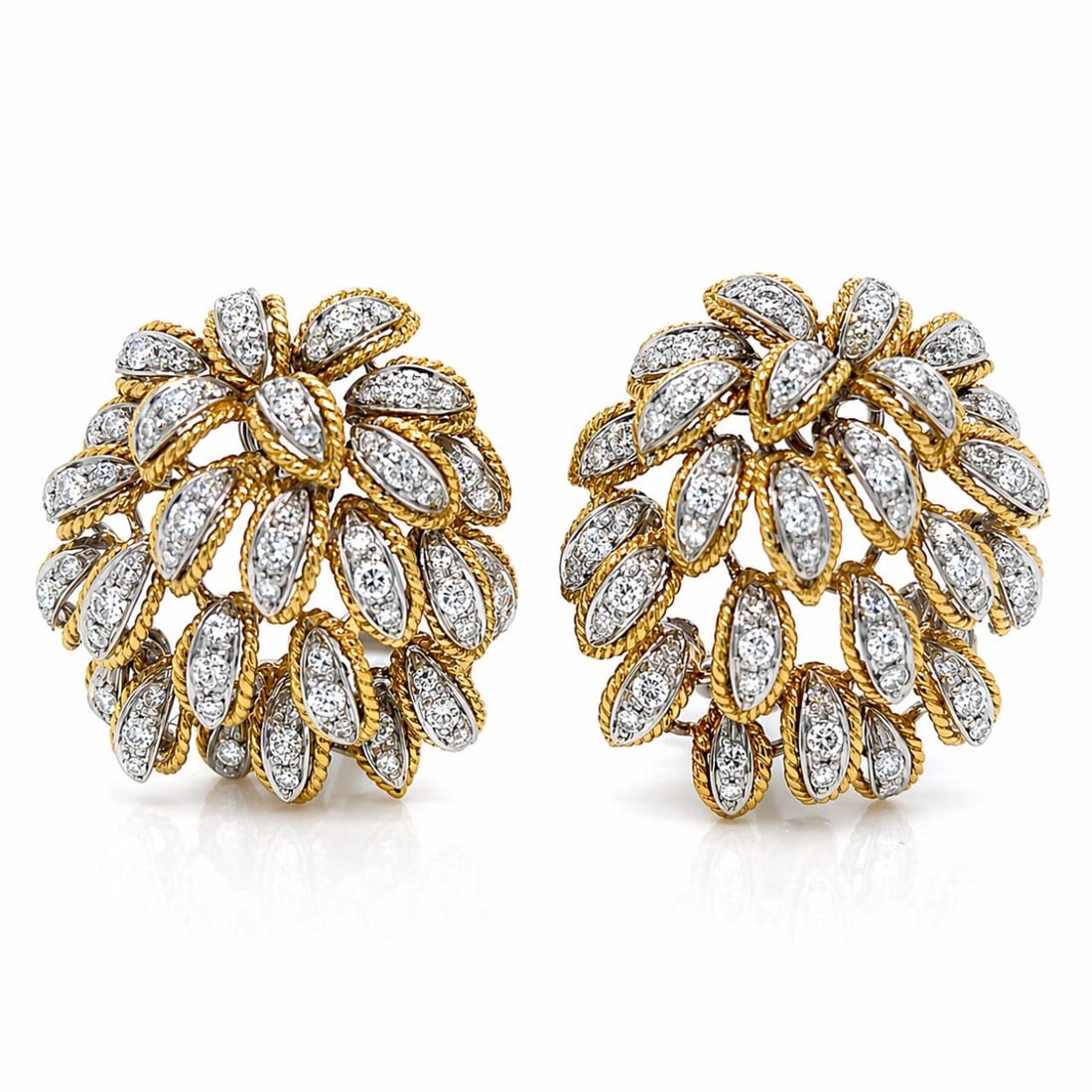 18K Yellow Gold Earrings with 2.7 Ct Diamonds 1960s: 18K Yellow Gold Earrings with 2.7 Ct Diamonds 1960s These 1960's 18K yellow gold earrings feature a striking design set with 136 diamonds totaling approximately 2.70 carats. The diamonds are of F-G co