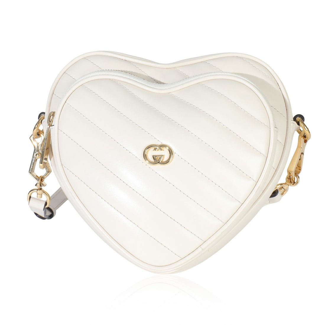 Gucci Mini Interlocking G Heart White Leather Shoulder Bag with Dustbag: Gucci Mini Interlocking G Heart White Leather Shoulder Bag with Dustbag This Gucci Creme Matelasse Calfskin Diagonal Mini Interlocking G Heart Bag is crafted in white leather with gold-tone hardware. 