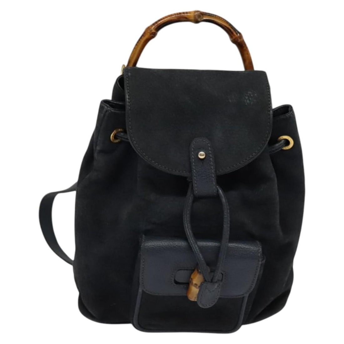 Navy Suede Bamboo Backpack by Gucci 20cm x 19cm x 7cm: Navy Suede Bamboo Backpack by Gucci 20cm x 19cm x 7cm This Gucci bamboo backpack is crafted from navy suede and features the iconic bamboo detailing. Designed for women, it offers a compact and stylis