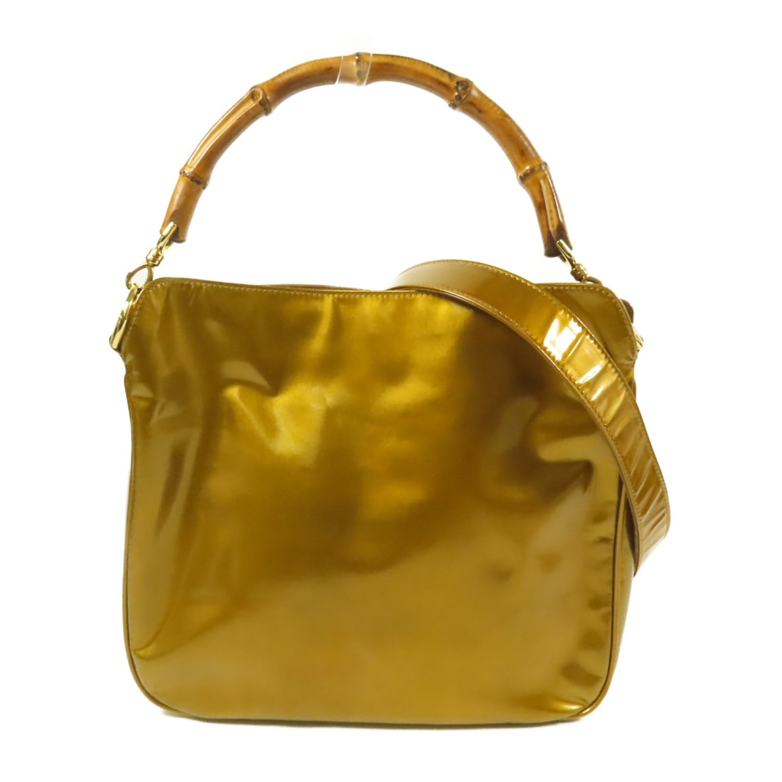 GUCCI 2 Way Shoulder Bag Patent Leather Gold Hardware: GUCCI 2 Way Shoulder Bag Patent Leather Gold Hardware Elevate your style with this GUCCI GG 2 Way Shoulder Bag crafted from luxurious patent leather in a stunning gold hue. Designed for versatility, t