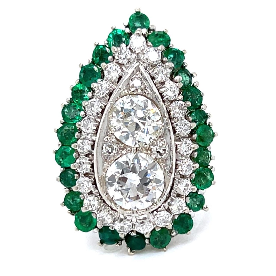 1960's 14K White Gold Diamond Emerald Ring 1.35 Ct Diamond 24 Emeralds: 1960's 14K White Gold Diamond Emerald Ring 1.35 Ct Diamond 24 Emeralds This stunning 1960's ring features an elegant design crafted from 14K white gold. The centerpiece is a brilliant approximately 1.