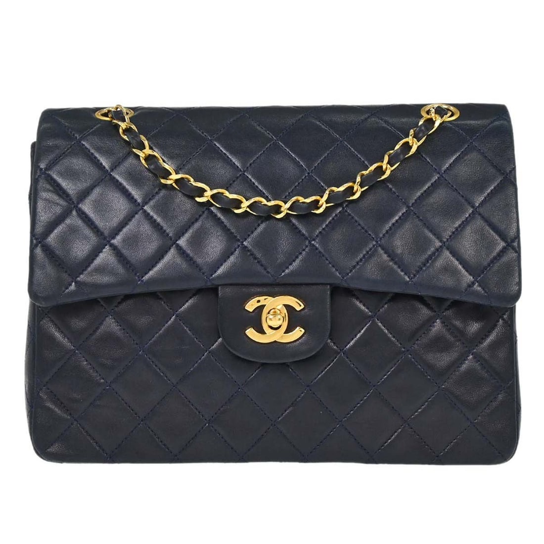 Chanel Medium Matelasse Leather Double Flap Navy Shoulder Bag: Chanel Medium Matelasse Leather Double Flap Navy Shoulder Bag This Chanel Double Flap Medium Shoulder Bag features a classic matelasse pattern in navy leather with a matching navy lambskin lining. The