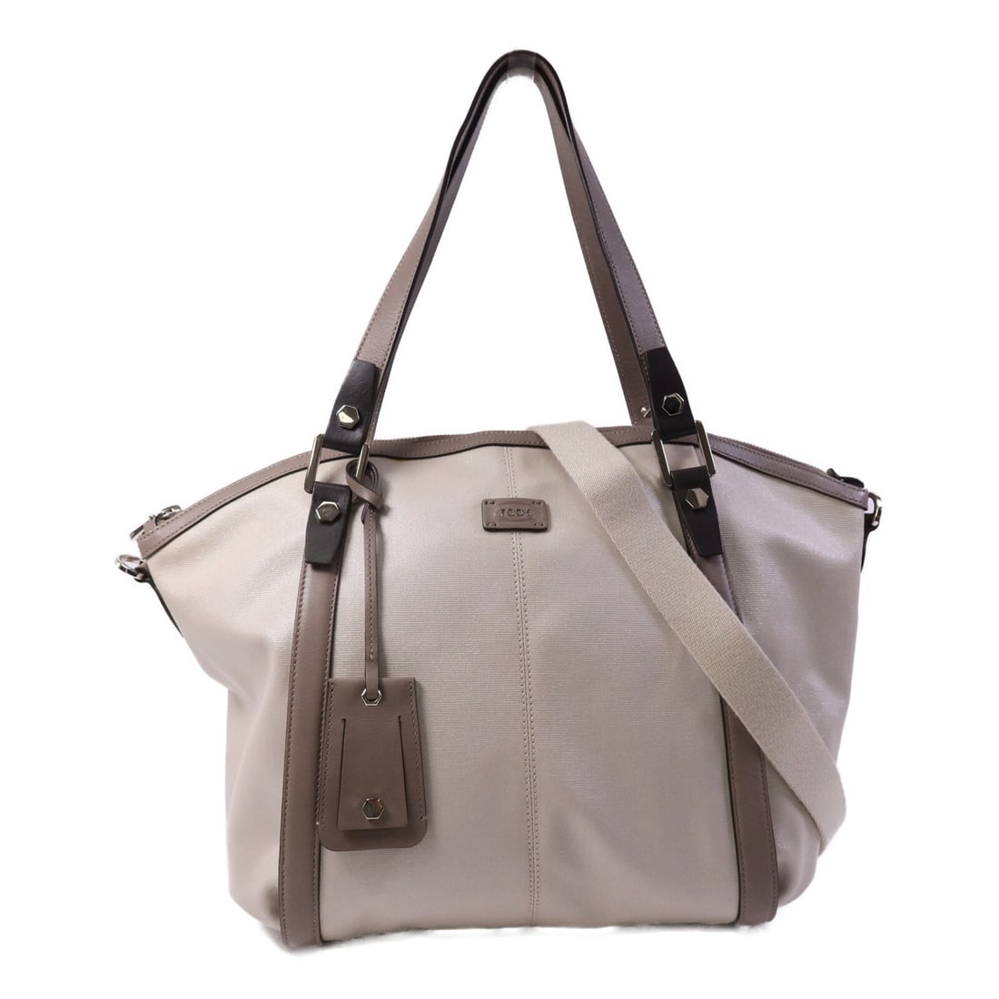 Beige G-Line 2-Way Shoulder Tote in Coated Canvas by TOD'S: Beige G-Line 2-Way Shoulder Tote in Coated Canvas by TOD'S This TOD'S G-Line Sacca 2 Way Shoulder Bag features a beige PVC coated canvas exterior, offering both durability and style. Designed for wome